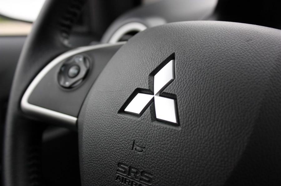  Mitsubishi Mirage 2014 года  (фото 17 из 39)